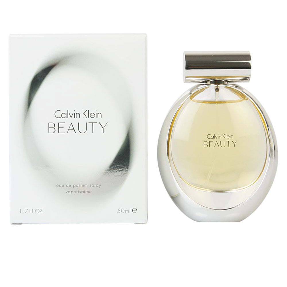 Clear glass 100 ml perfume bottle with floral fragrance notes of jasmine and cedar for Women