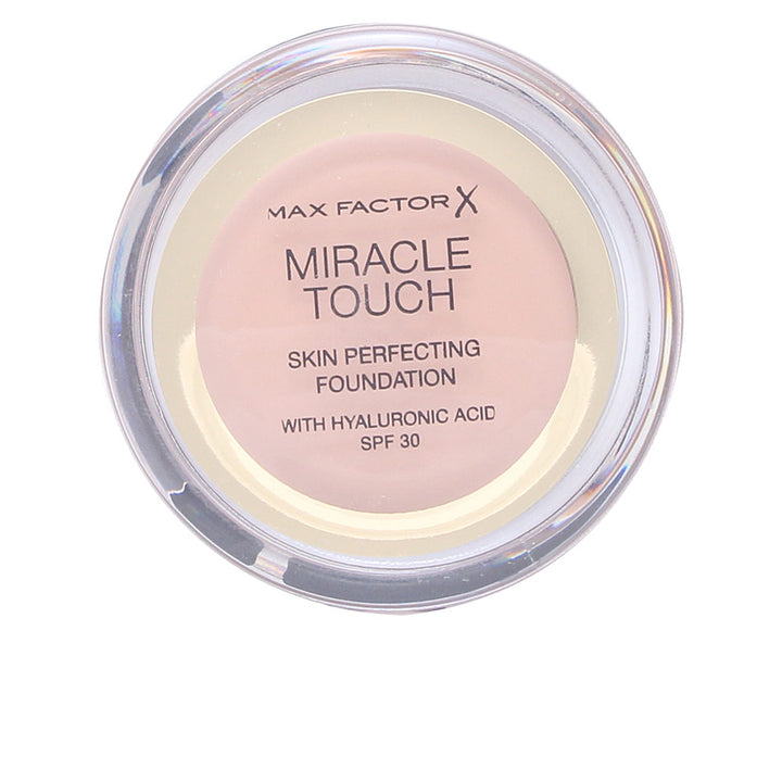 Compact 12 g solid-to-liquid foundation in shade 070 Natural