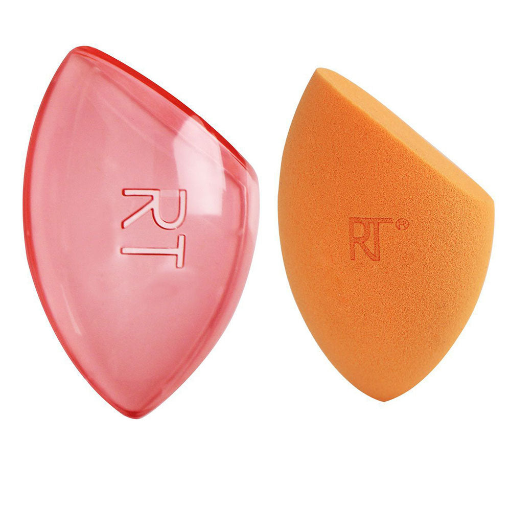 Real Techniques Soft teardrop makeup sponge with tapered point and rounded base, paired with a clear travel case