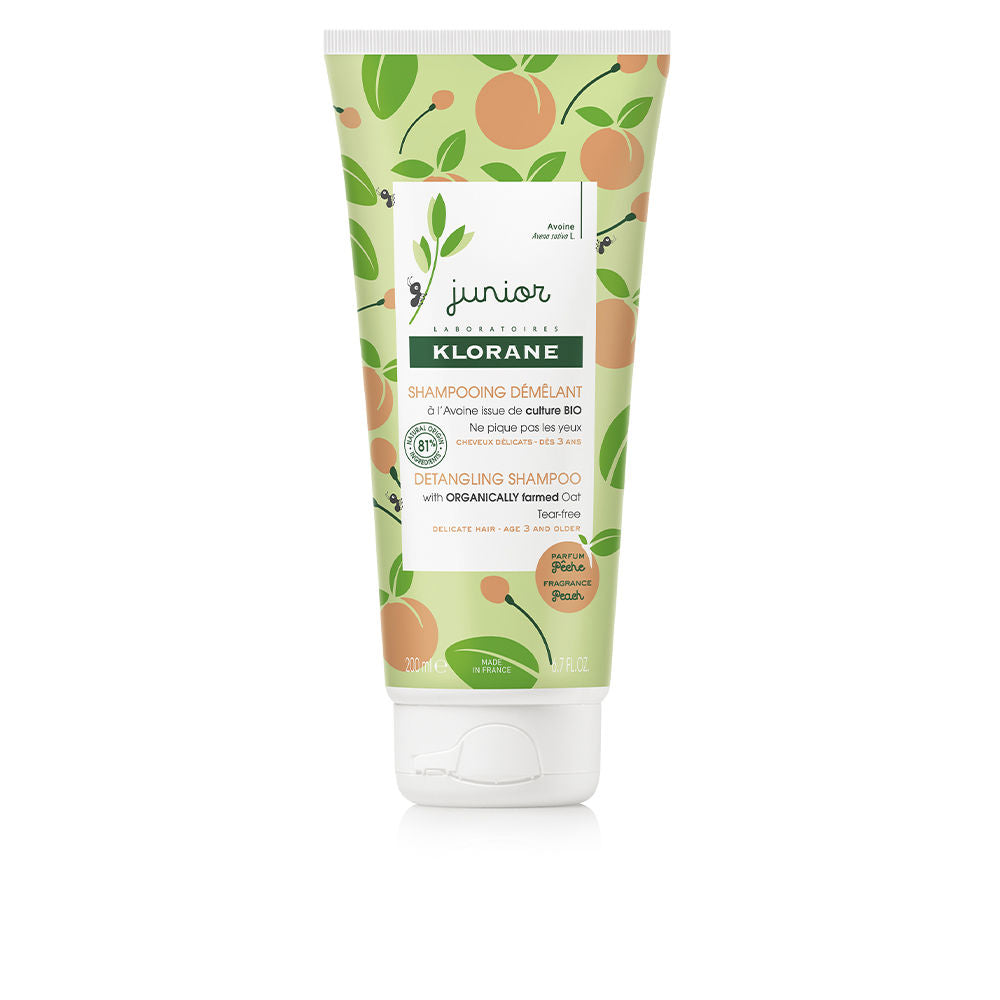 Bottle of Klorane JUNIOR peach detangling shampoo for children with peach scent