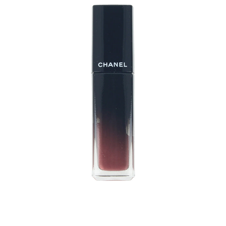 Glossy brown liquid lip with precision applicator; high-shine finish.