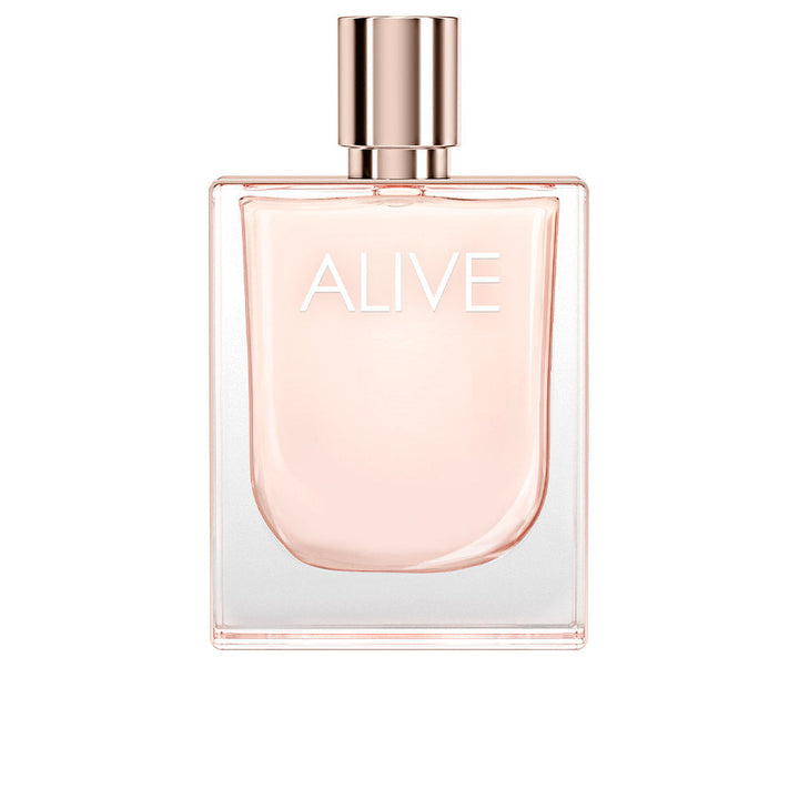 Clear crystal bottle of pale pink floral‑woody Eau de Toilette, 80 ml, rose‑gold detail