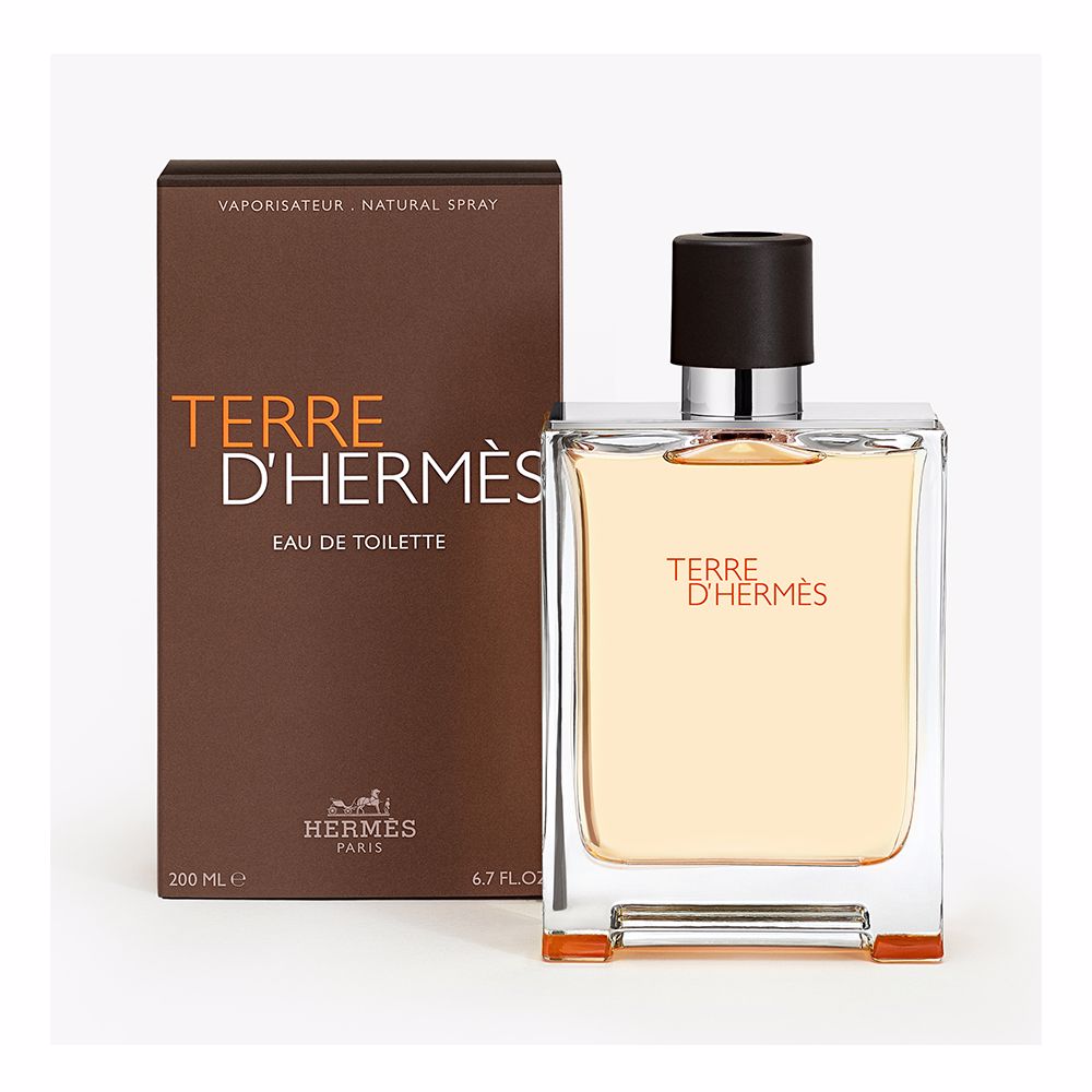 Rectangular glass bottle with metal shoulders; 100 ml woody-citrus perfume for Man