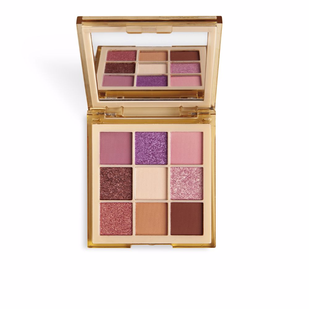 Compact nine‑shade eyeshadow palette with matte and shimmer pans, very nude tones
