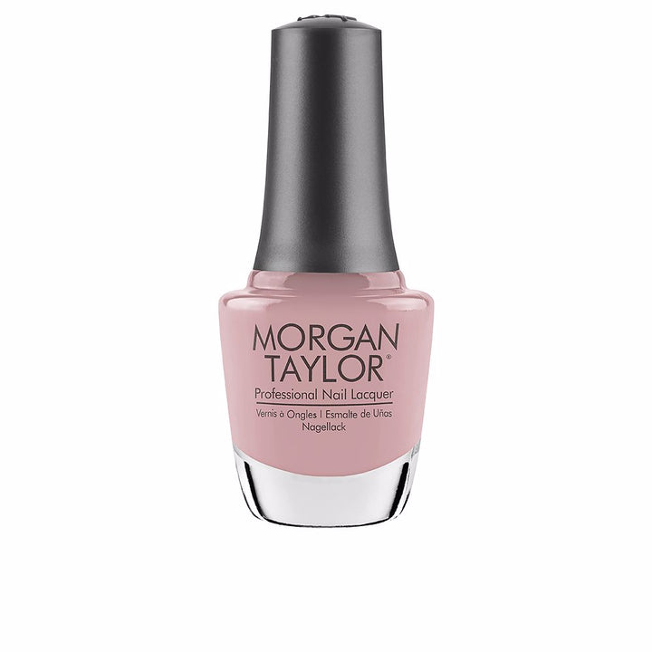 15 ml clear glass bottle of creamy gardenia nail lacquer with curved brush