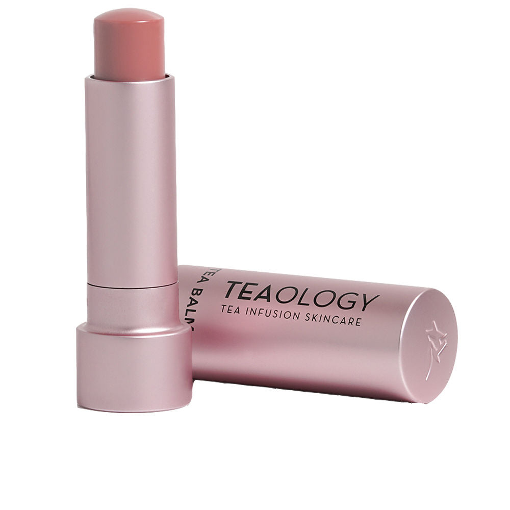 Peach-tinted 4 g lip balm in solid stick, smooth satin finish