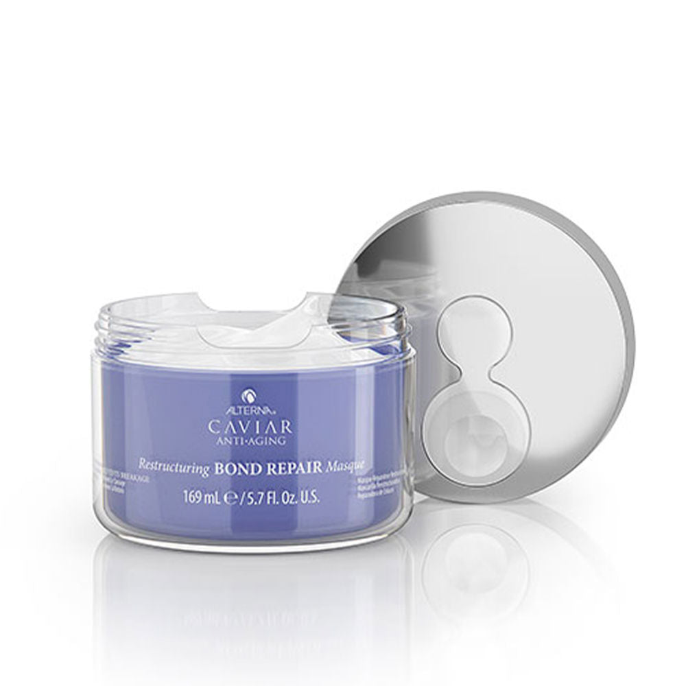 Jar of creamy repair hair masque labelled Caviar Restructuring Bond, 161 g