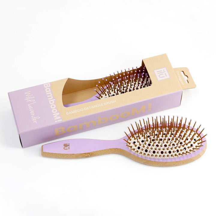 Oval bamboo hairbrush in lavender tone with vented cushion and anti‑static bristles