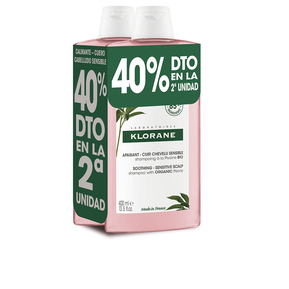 Tube of gentle peony-root shampoo with pale pink liquid, Unisex daily care