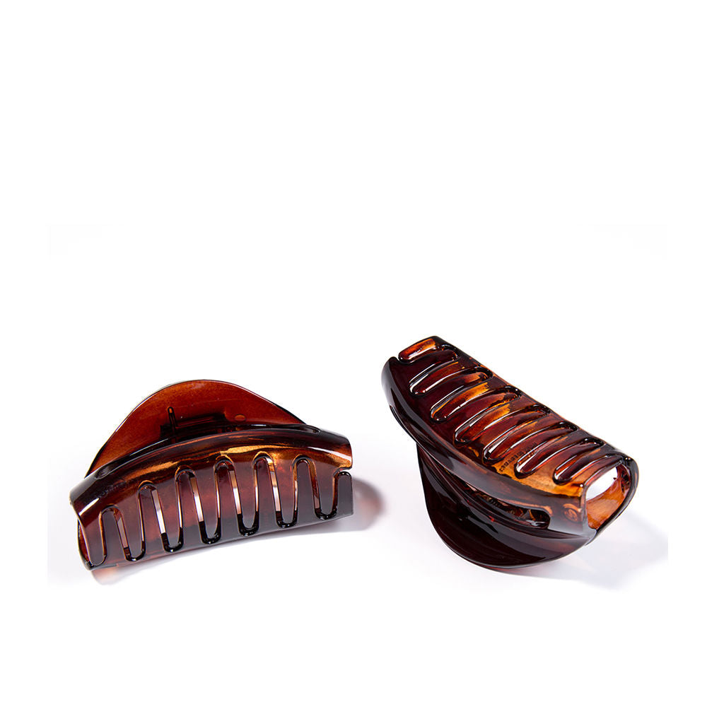 Brown translucent plastic hair claw clip with curved shape, wide teeth and spring hinge — Inca