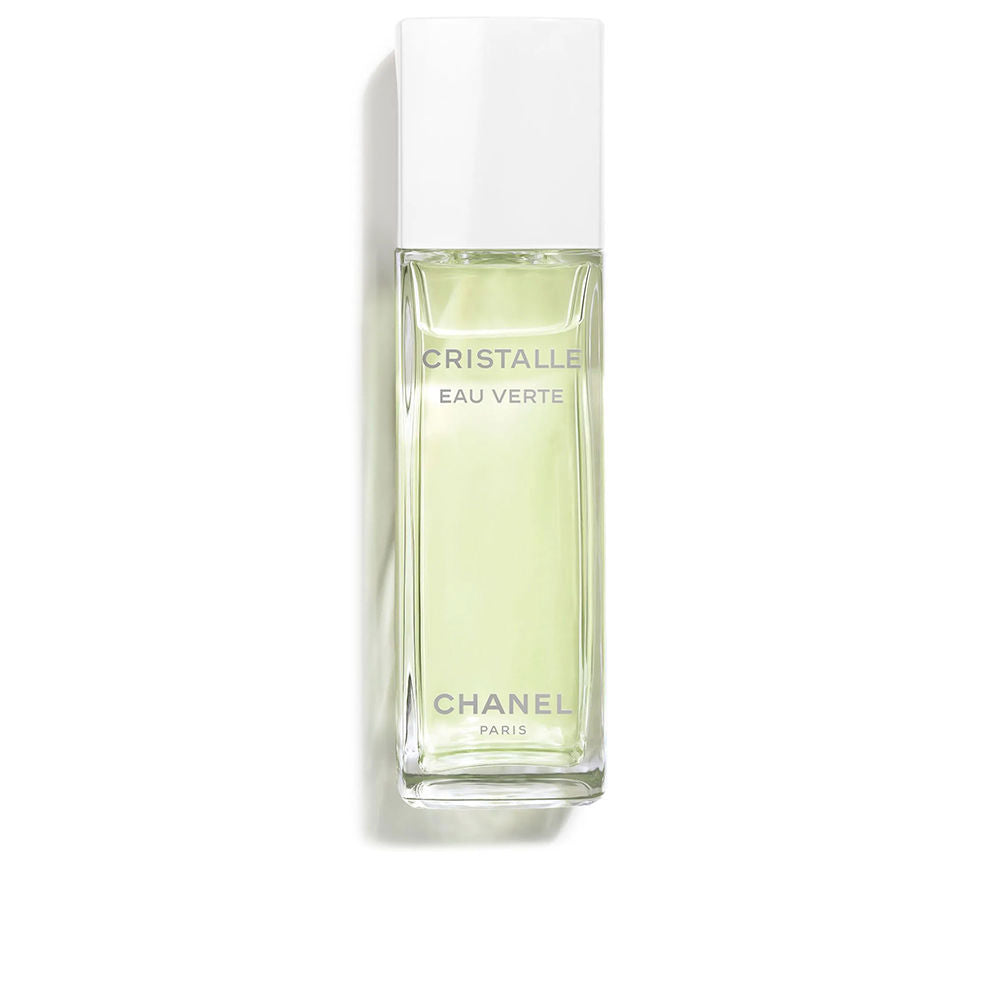Clear glass perfume bottle labelled Green Magnolia, 100 ml, spray atomiser