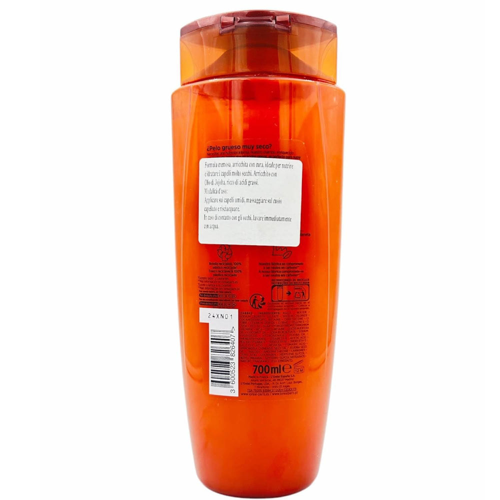 700 ml shampoo bottle — lightweight floral formula for dry hair, Unisex