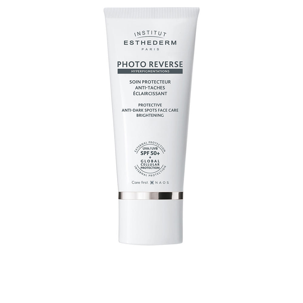 Institut Esthederm White minimalist plastic tube face cream with black text, silver band and flip-top cap