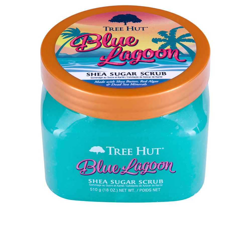Tree Hut Turquoise blue round plastic jar with orange lid, transparent body showing scrub; tropical sunset label