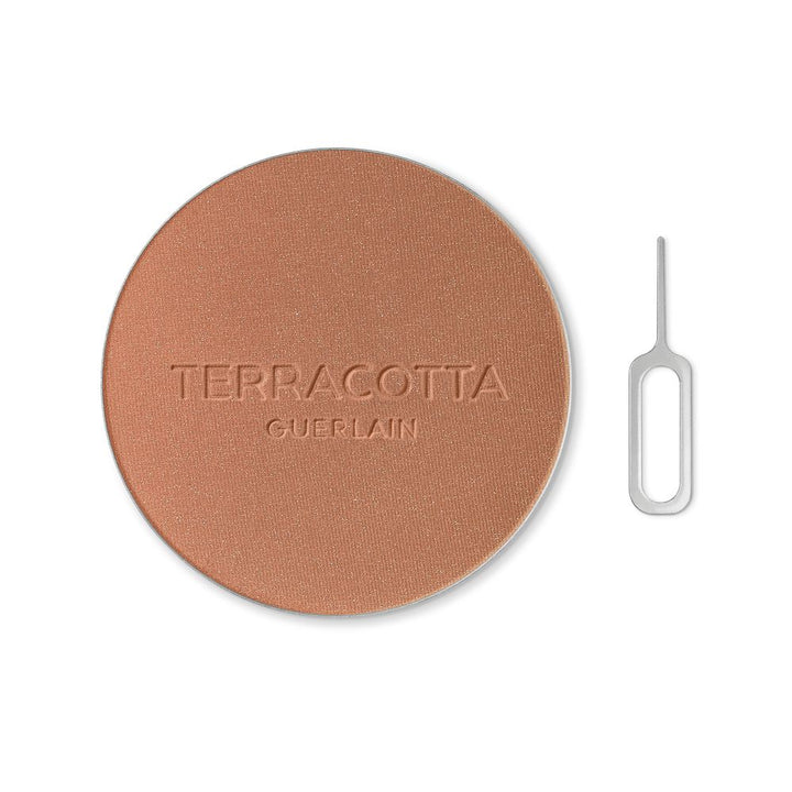 Terracotta bronzing powder refill pan in deep cool shade, 8.5 g, powder surface visible