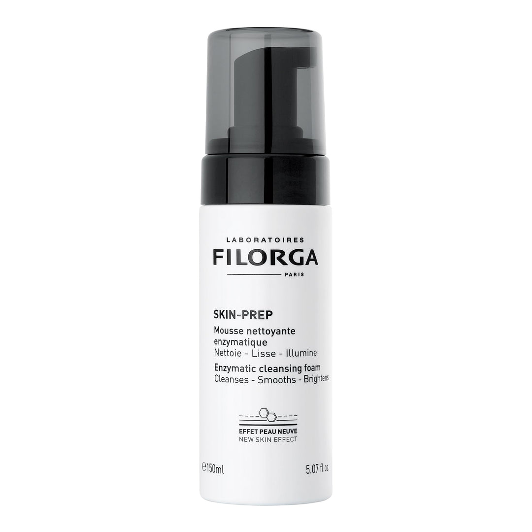 Laboratoires Filorga White foaming bottle with pump dispenser, labeled enzymatic face and eye cleansing foam