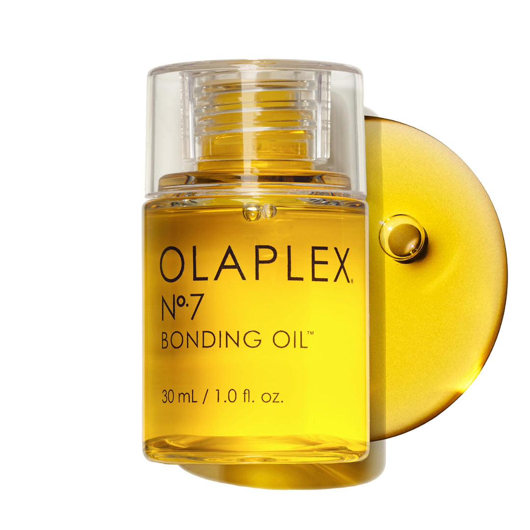 60 ml clear bottle of lightweight repairing hair oil with seed-oil blend, for Unisex use