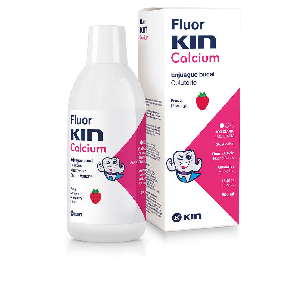 White plastic mouthwash bottle with pink cap, strawberry label and cartoon tooth on blue box — Kin