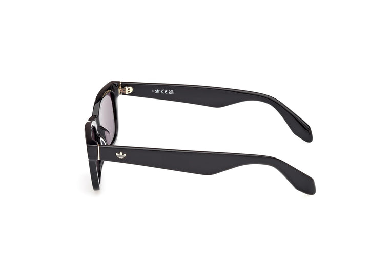 Marcolin Black plastic Navigator sunglasses with rectangular lenses, thick solid frame, slightly curved temples