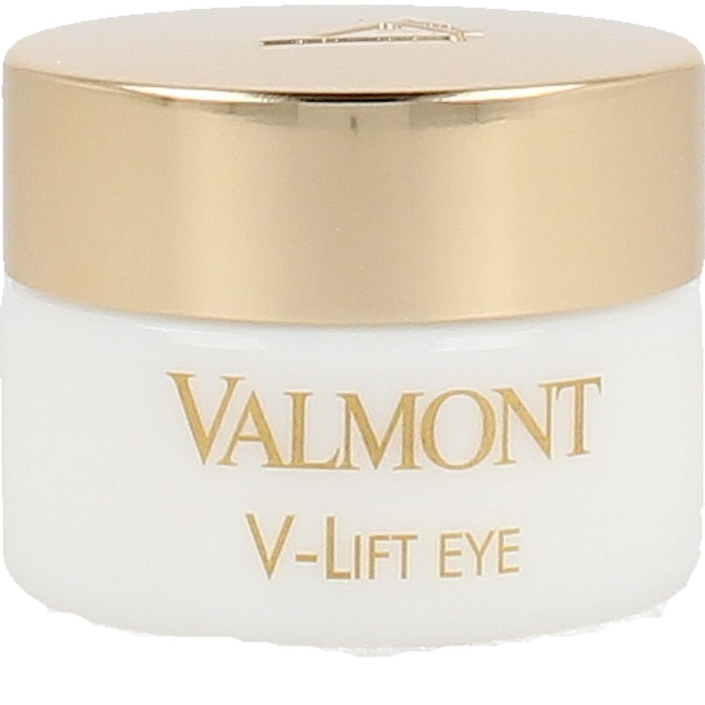 White and gold round eye cream jar with gold metallic lid and embossed text, compact luxury design by Valmont