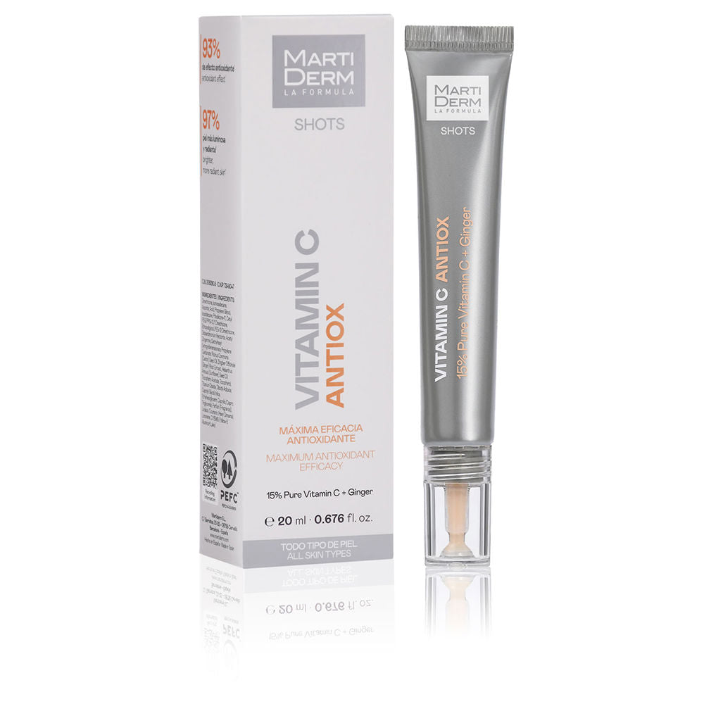 Modern, minimal white-gray-orange plastic tube with applicator tip and accompanying box — Martiderm