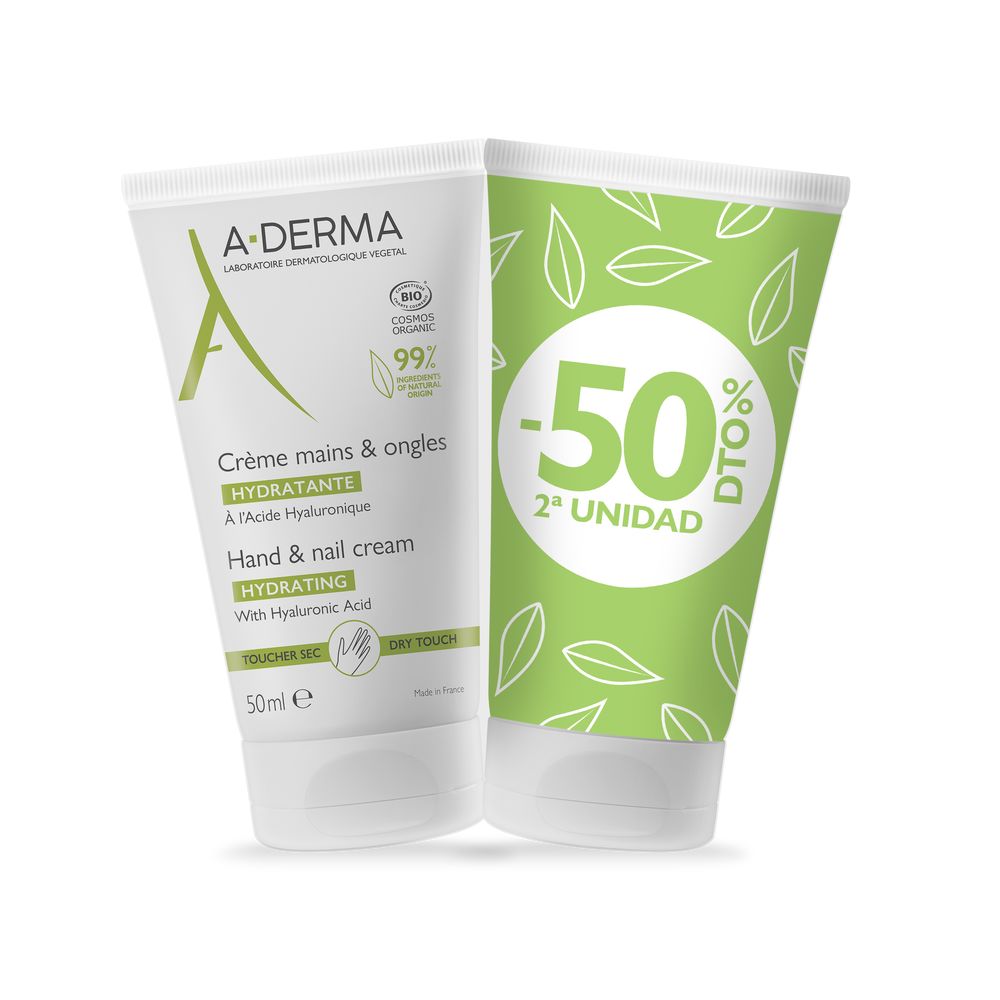 Tube of A-DERMA Hand &amp; Nail Cream beside hands and oat sprig on neutral background