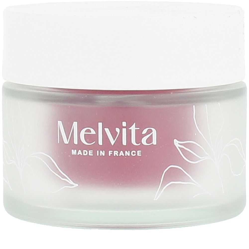 Melvita Frosted glass face cream jar with white screw-on lid, pink floral line art and brand name text