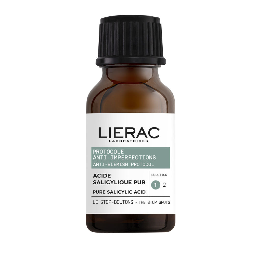 Lierac Small amber glass serum bottle with black ribbed screw cap, white label, green highlight, numbered indicator