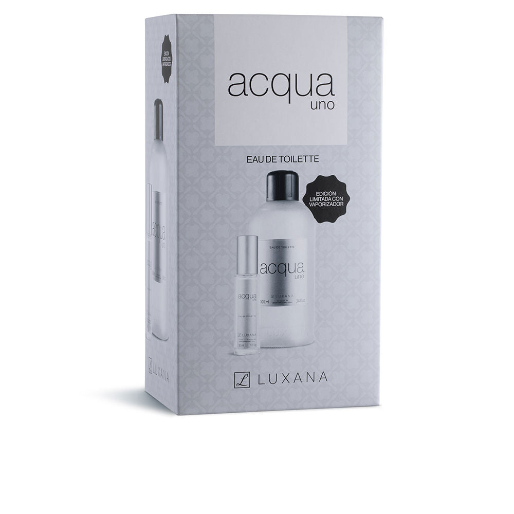 Clear glass bottle of citrus-aromatic Unisex eau de toilette with lemon and floral notes