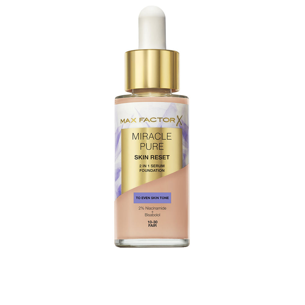 Max Factor Glass foundation bottle with dropper cap, transparent body, gold textured label, visible beige liquid