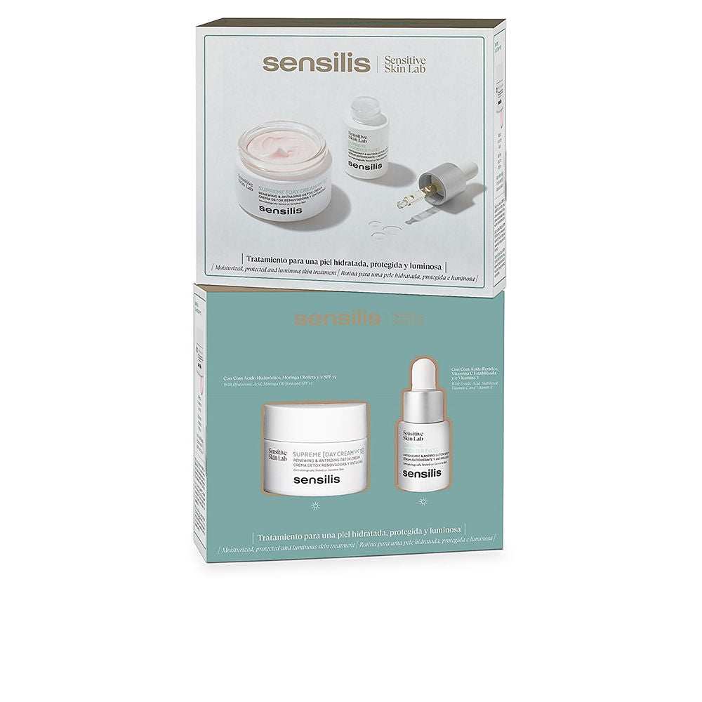 Jar of Sensilis SUPREME Day Cream beside subtle botanical accents