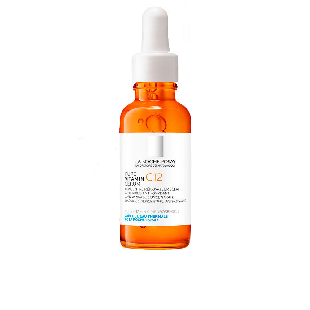 la Roche Posay Glass serum bottle with plastic dropper, transparent bottle, white label, orange liquid with bubbles