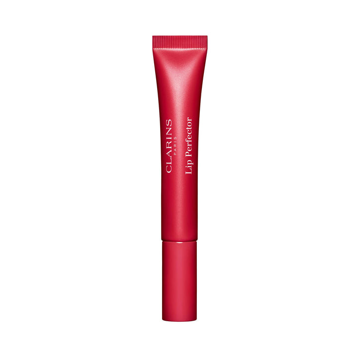 Tube of fuchsia sheer lip gloss with glossy, velvet gel finish, 12 ml, Unisex