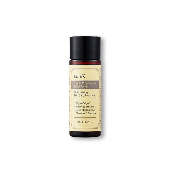 Klairs 30 mL cylindrical plastic toner bottle with black screw cap, cream label and blue panel.