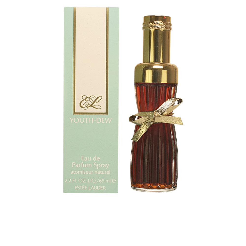 Estée Lauder Glass perfume bottle with ribbed amber body, gold cap and bow, seated by a beige and light-green box—Est e9e Lauder