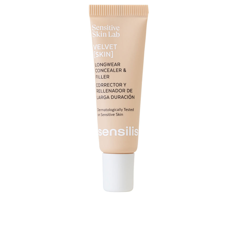 Sensilis optical enhancer tube beside soft-focus cream on warm background