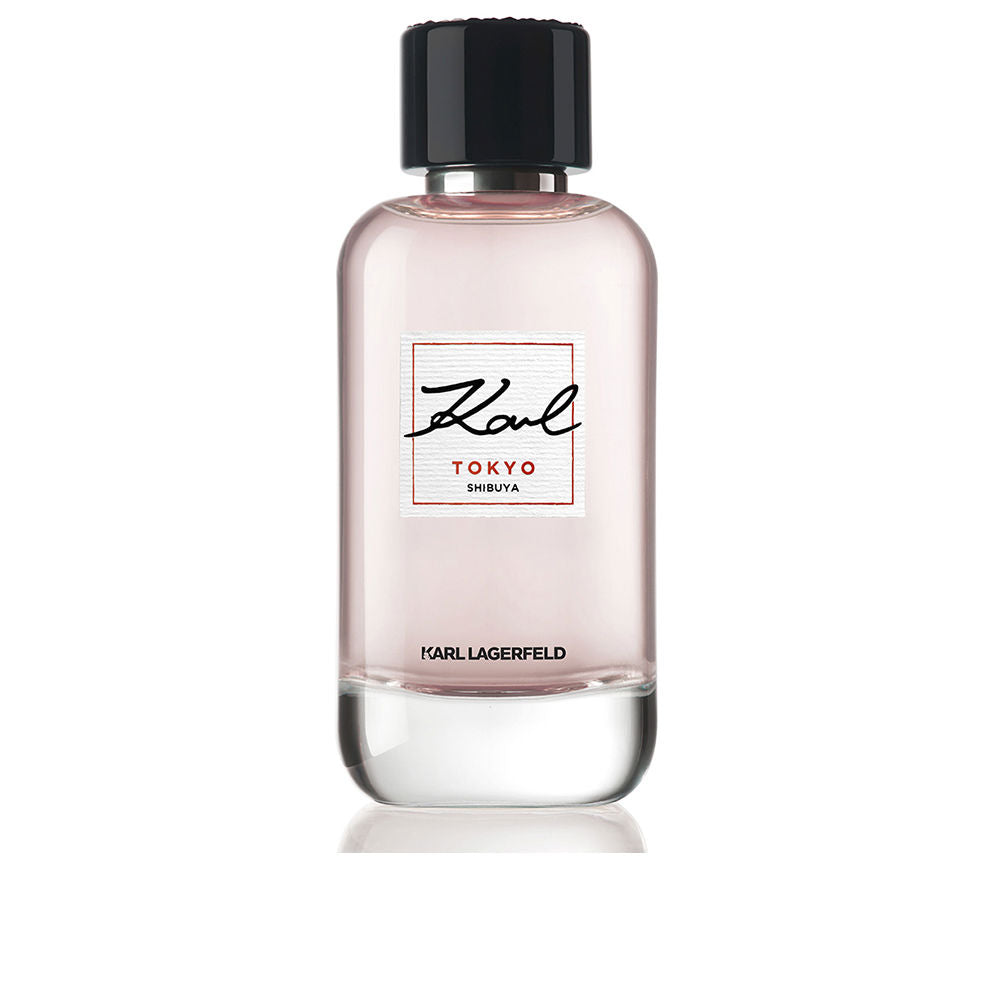 Clear perfume bottle labelled Cherry Blossom, 100 ml, floral woody scent for Women