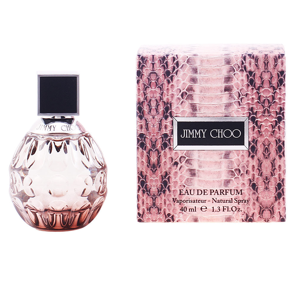 Round pink-hued perfume bottle; 40 ml, chipre-fruity orchid scent
