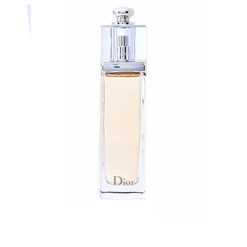 Dior Addict Eau de Toilette bottle—transparent luminous silhouette with warm floral-oriental fragrance.