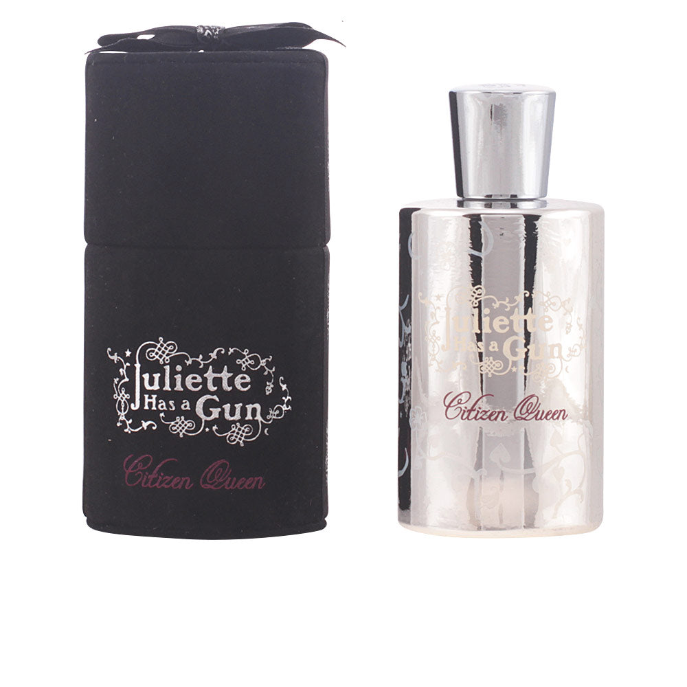 Juliette Has A Gun Ornate rectangular perfume bottle with metallic reflective surface and decorative floral pattern, black fabric box with bow — .
