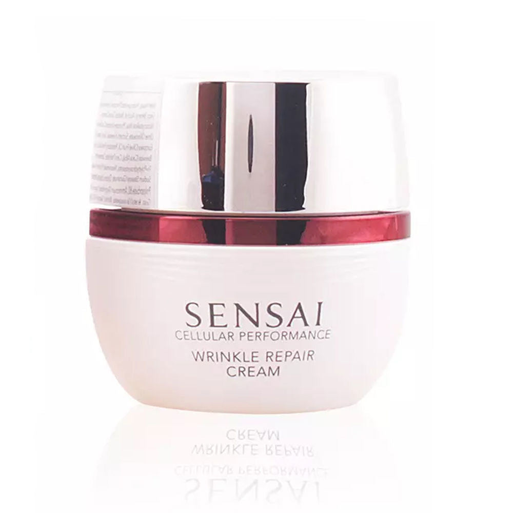 Sensai White plastic round cream jar with silver screw-on lid and red label, minimalist design