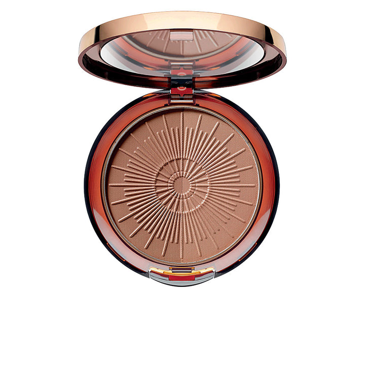 Compact terracotta bronzing powder with embossed sun and four duotone shades, 10 g