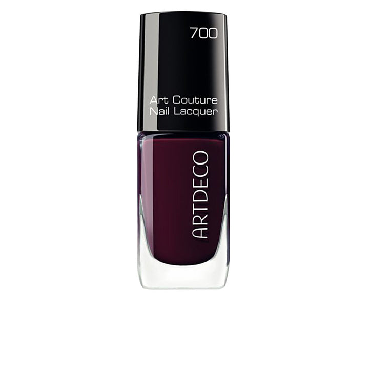 10 ml bottle of deep pink-mauve nail lacquer with wide application brush