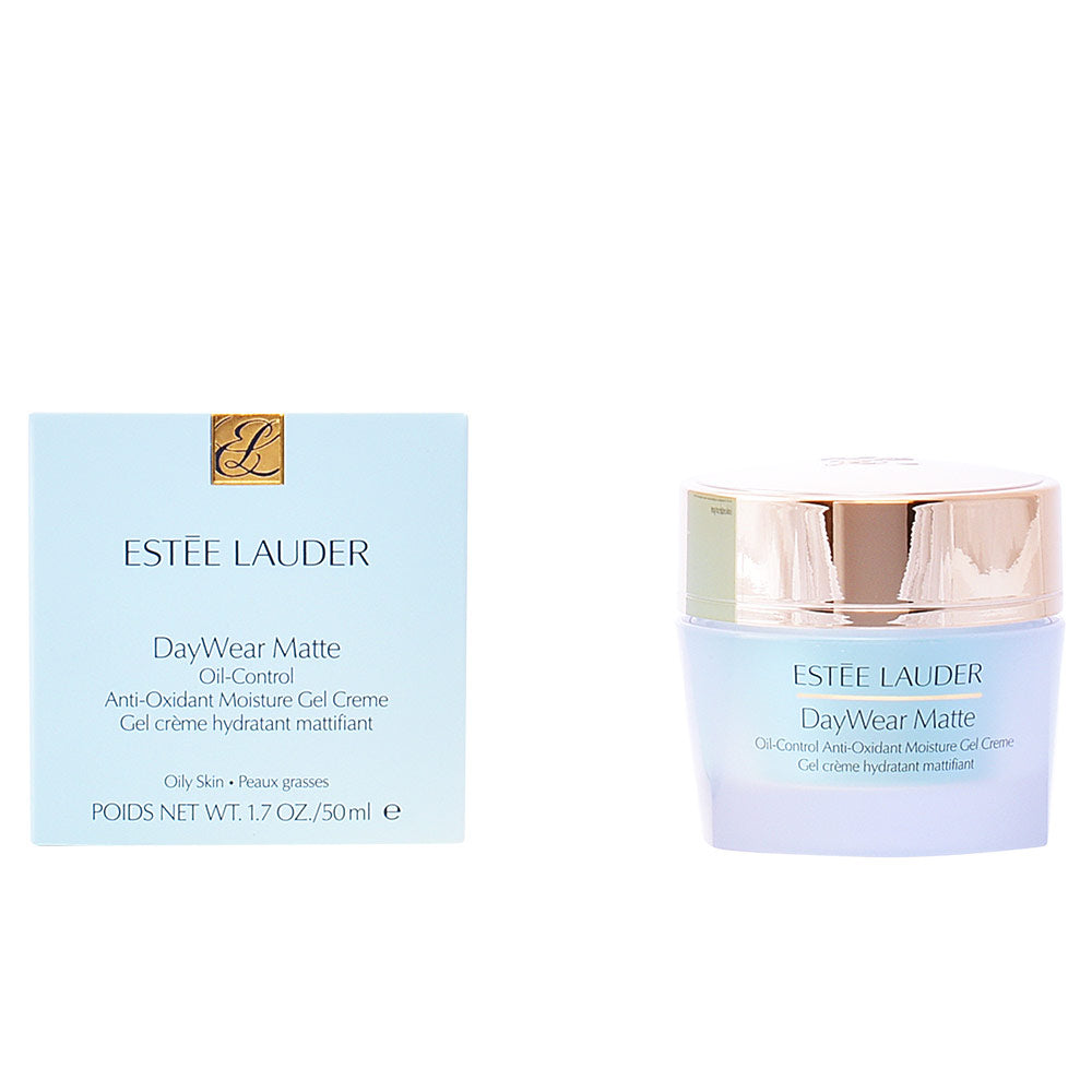 Estée Lauder Light blue and gold moisture gel creme jar with screw lid and matching box, refined minimalist packaging .