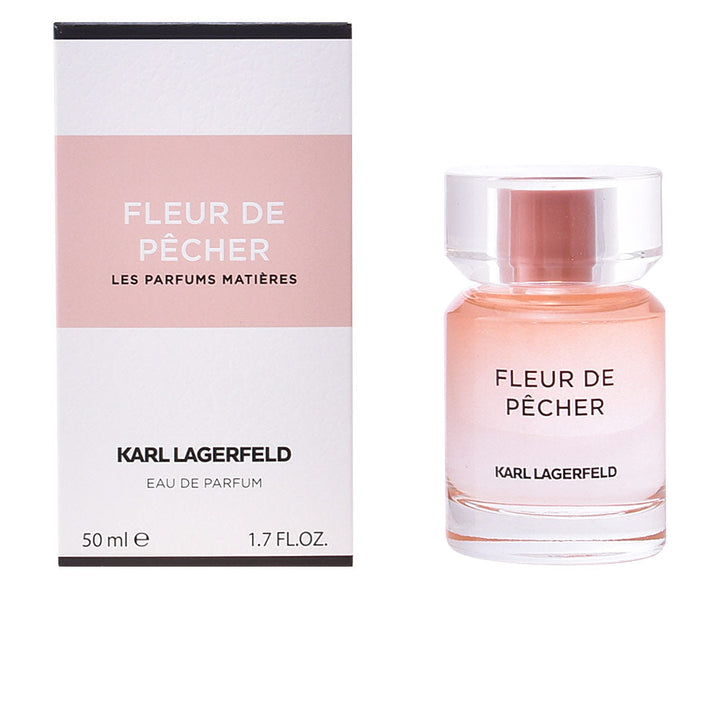 Clear cylindrical 100 ml perfume bottle with pale pink atomiser and floral-fruity scent