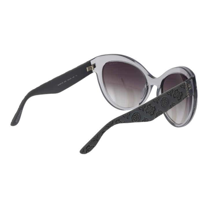 Gray cat-eye sunglasses on neutral background showing embossed temples and gradient lenses