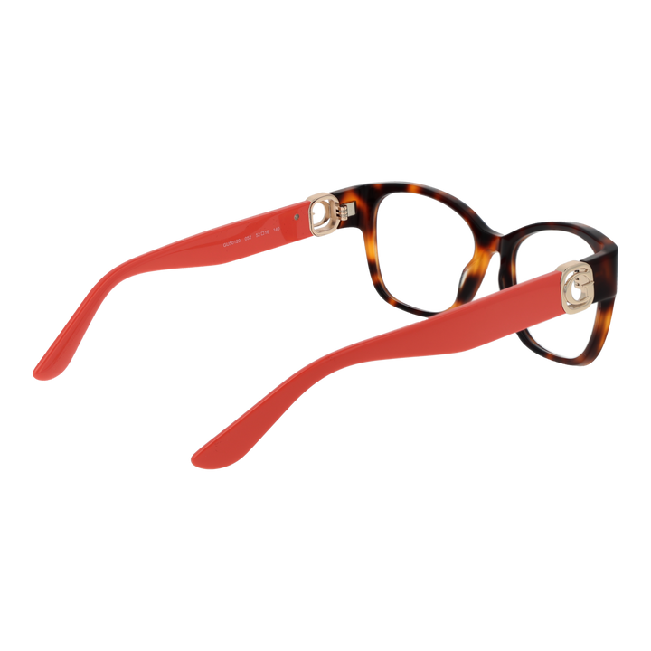 Tortoiseshell square eyeglasses in brown-orange with red arms and gold temple emblem on white background