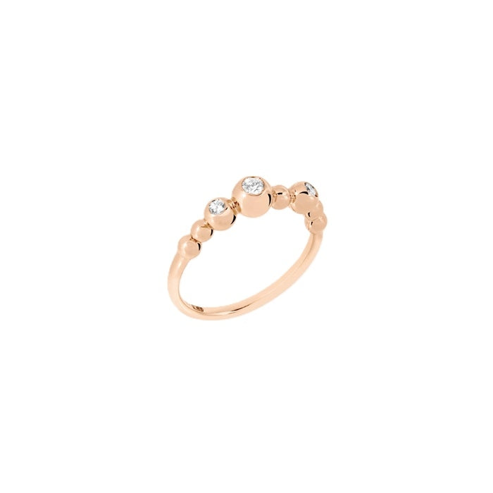 Delicate rose gold ring with central clear diamond and small decorative gemstones on band