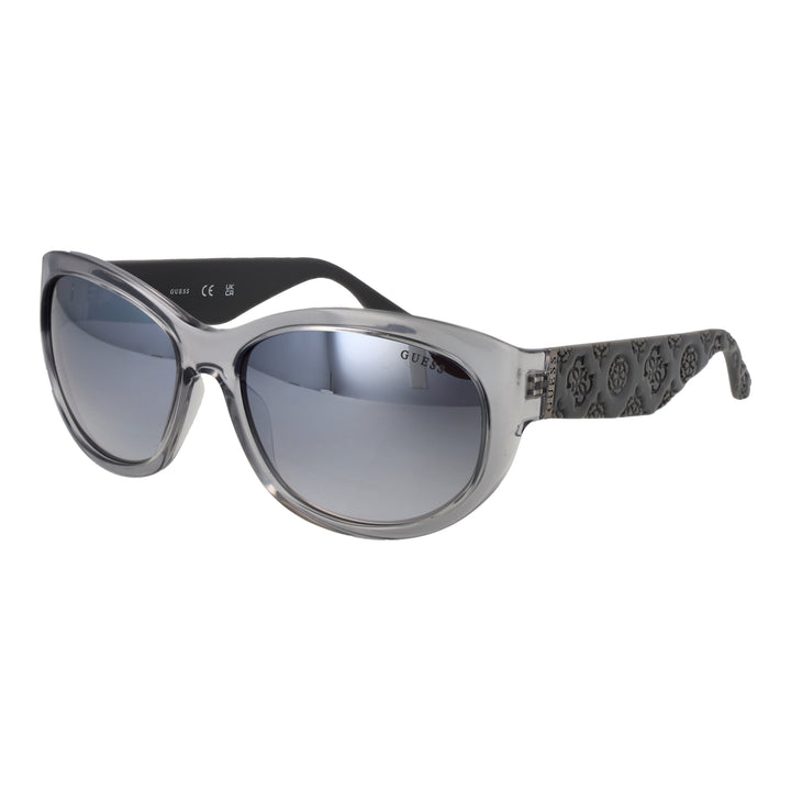 Gray cat-eye sunglasses in plastic with gradient lenses and embossed temples, Guess logo visible