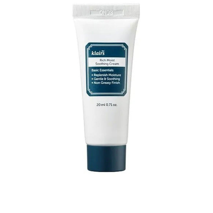Soft white soothing cream tube with dark blue screw-on cap, rectangular bordered label and printed text, Klairs